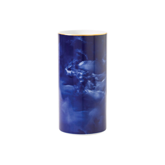 Blue cylindrical vase with a white base on a white background