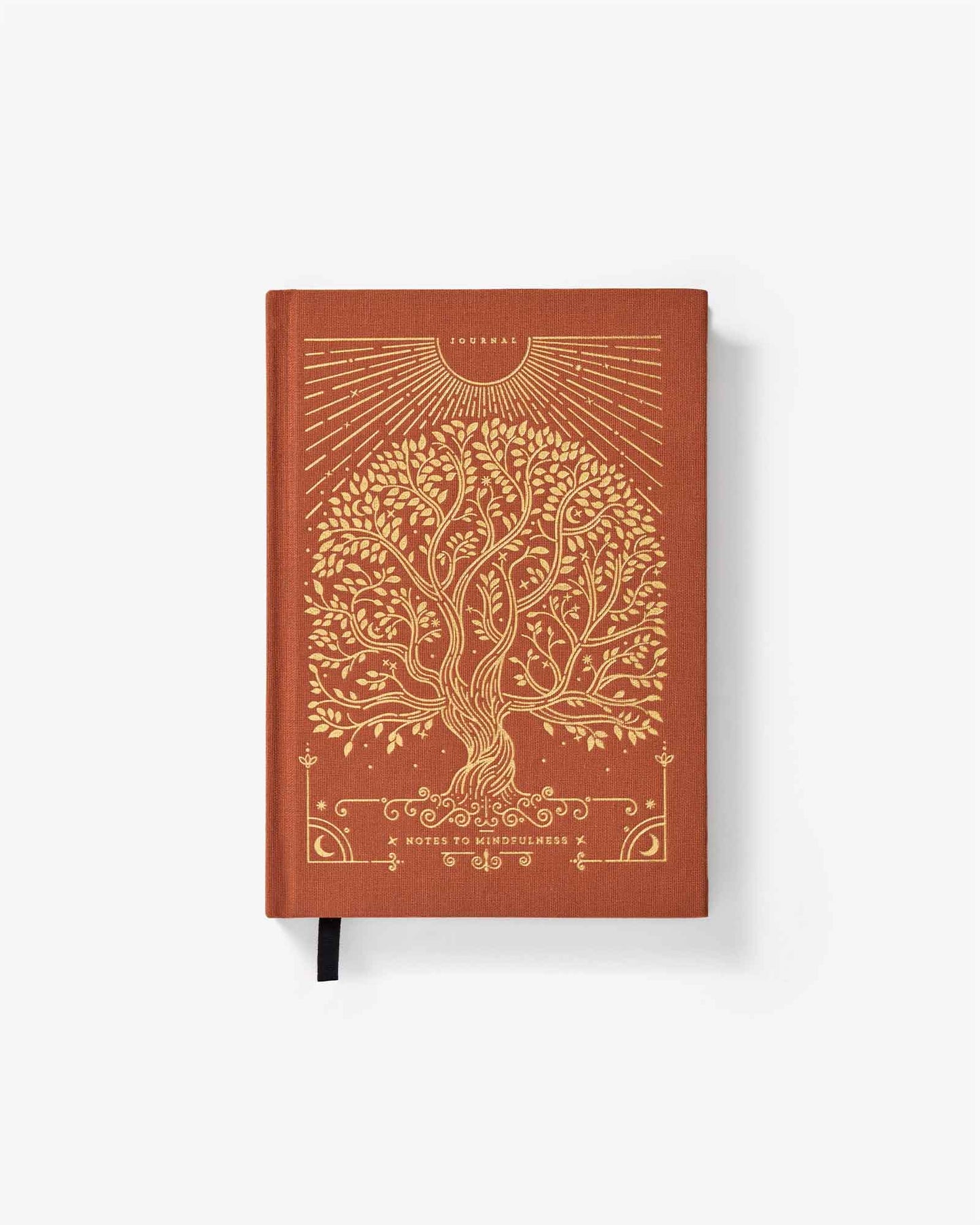 Brown notebook with gold tree design on a white background