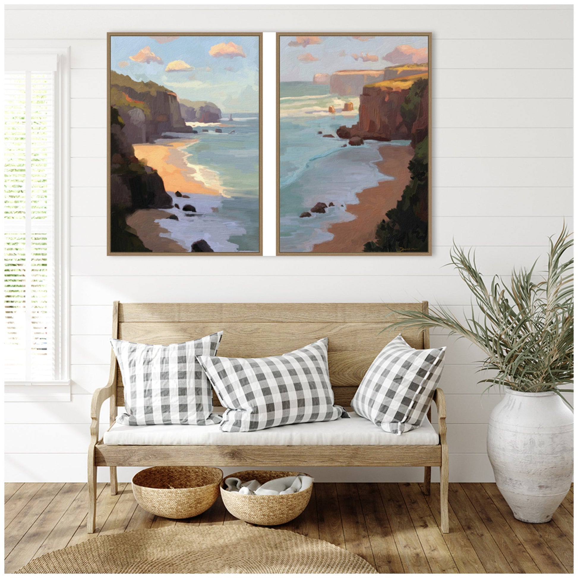 Nautical-themed wall art above a wooden bench with checkered pillows in a room with a plant and woven baskets.