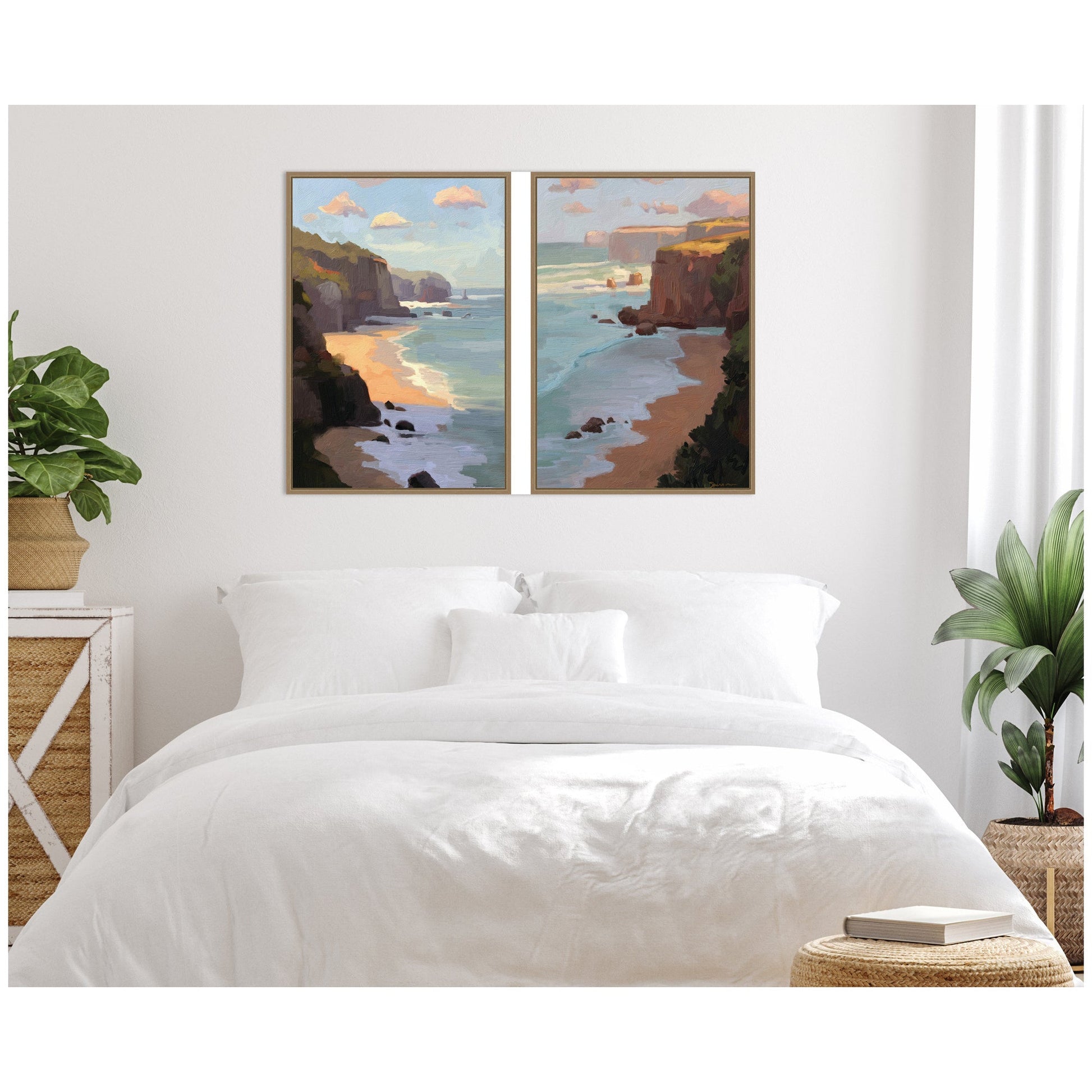 Bedroom with two beach scene paintings above a bed