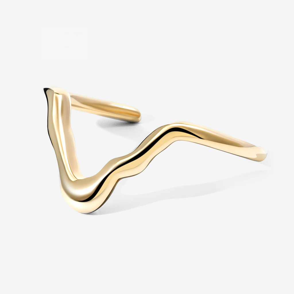 A polished gold wavy cuff ring with a smooth, flowing triangular design, shown on a clean light gray background.