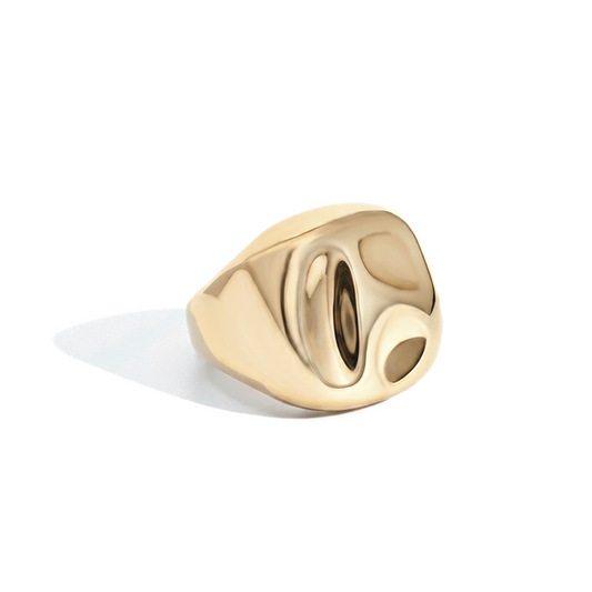 Gold ring on a white background