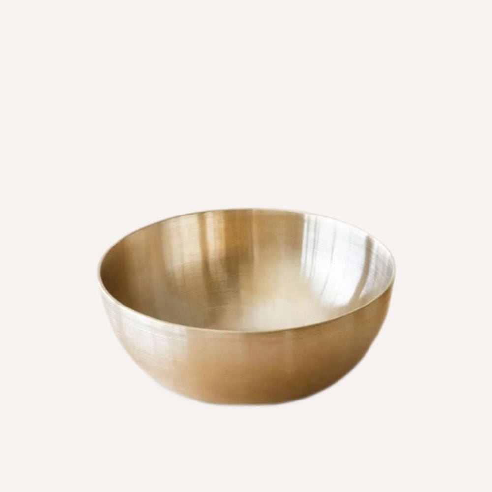 Gold bowl on a white background