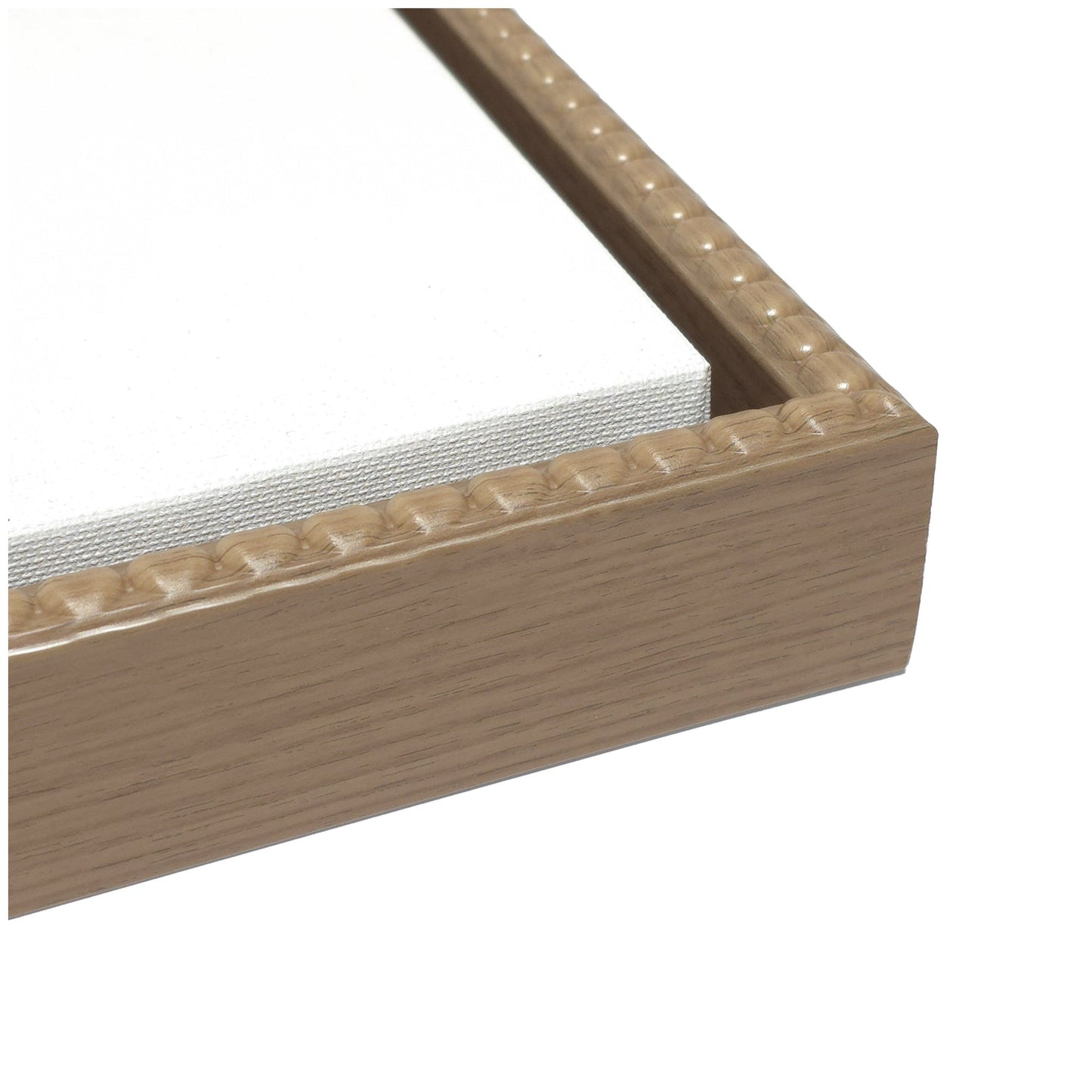 Wooden picture frame corner with white matting on a white background