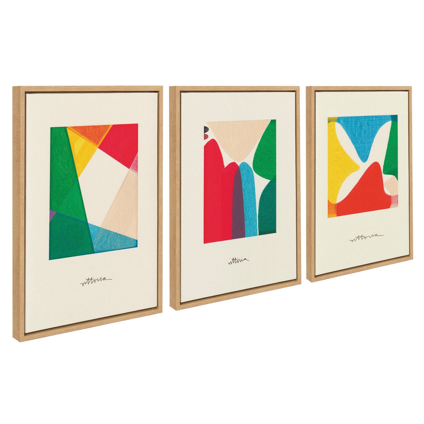 Three abstract art prints in wooden frames on a white background