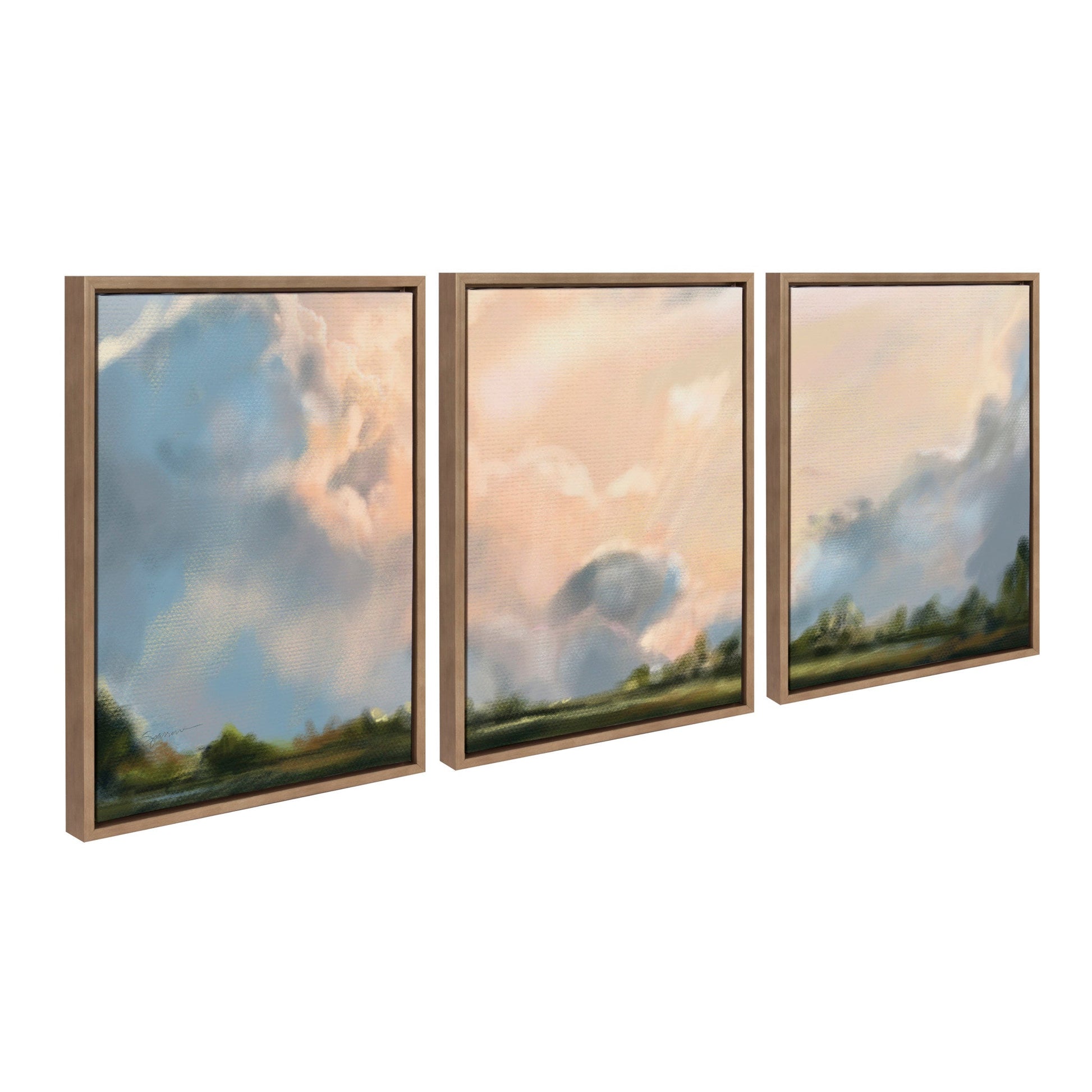 Set of three framed paintings with a landscape theme on a white background
