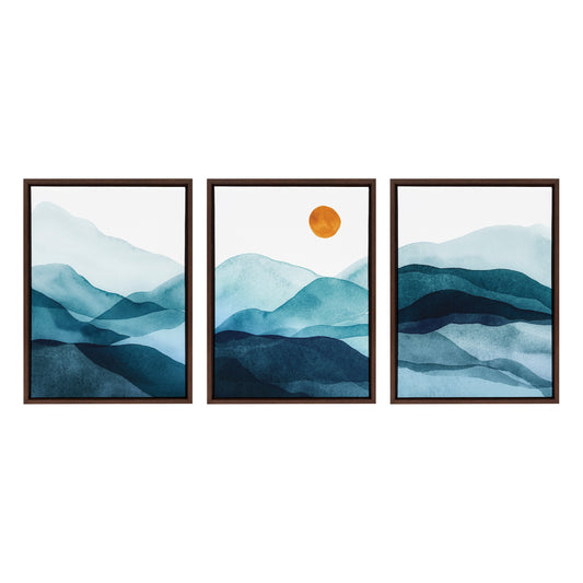 Set of three framed abstract mountain landscape artworks with a central orange sun.