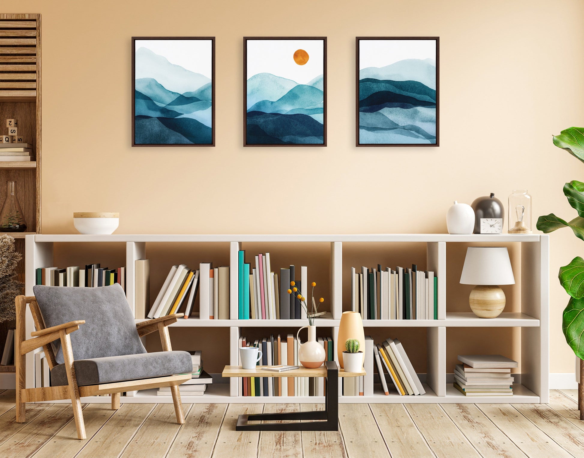 Living room with a bookshelf, armchair, and wall art